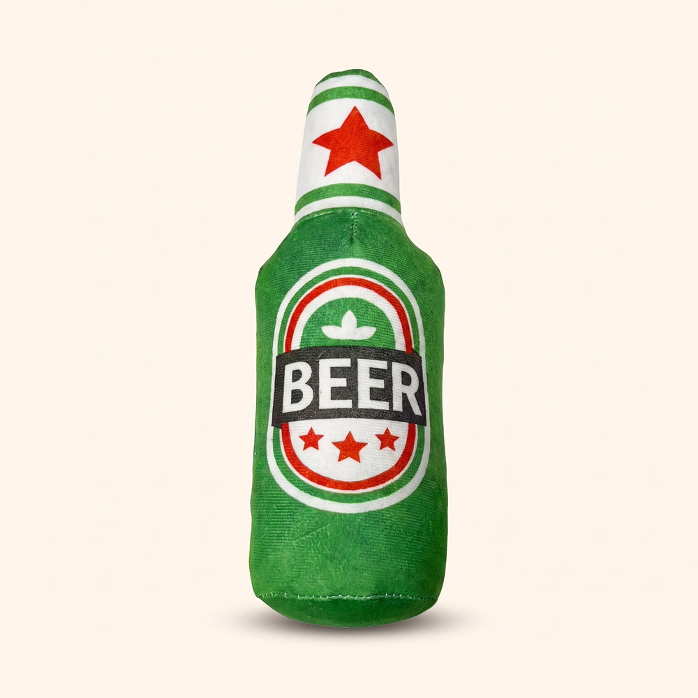 Green plush beer bottle squeaky dog toy included in The Bad Influence Bundle