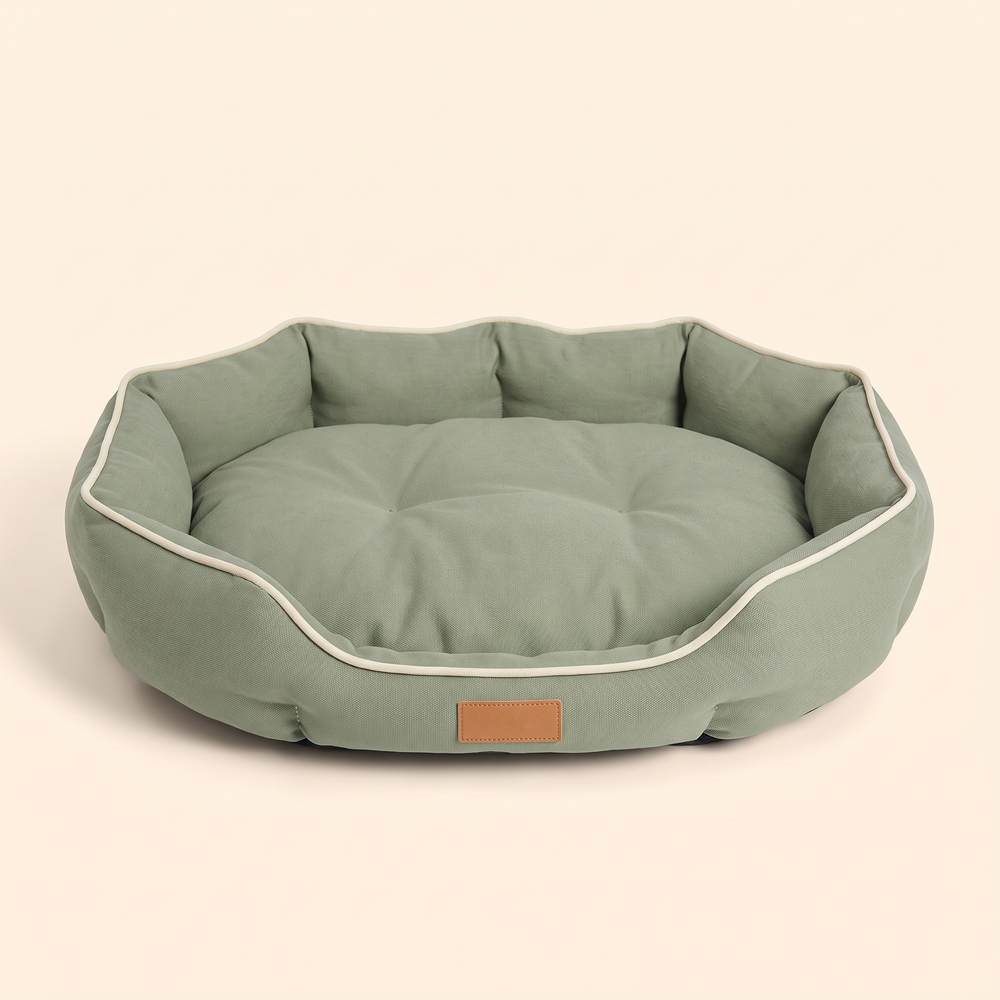 Large dog sofa bed in green, rounded bolster style