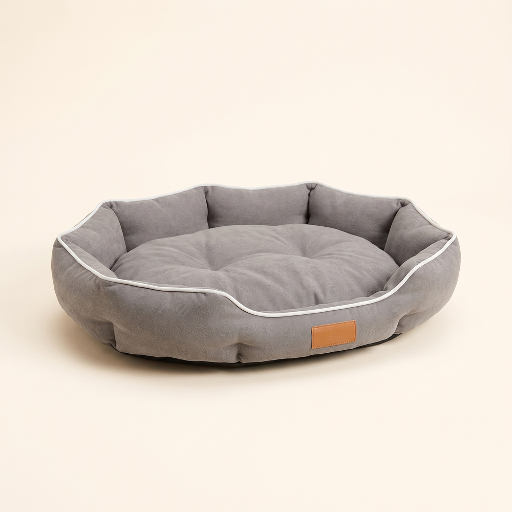 Large dog sofa bed in grey, rounded bolster style