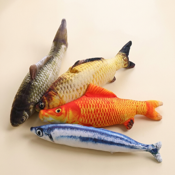 Realistic simulation fish plush cat toy on a cream studio background