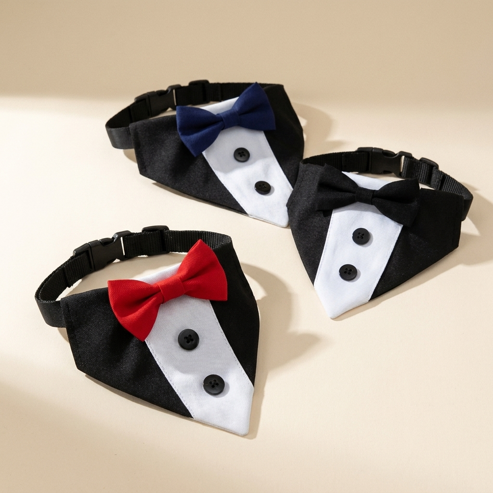Pet wedding suit bib with bow-tie collar on a cream studio background