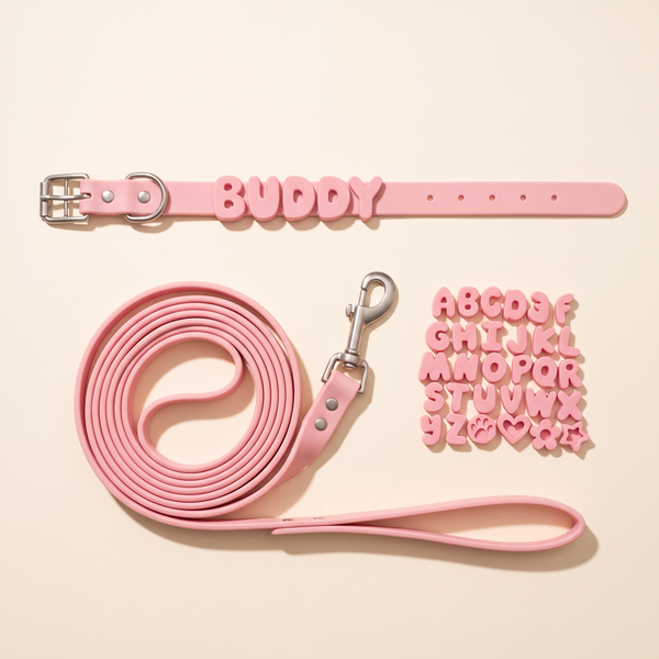 Full pink silicone name set: collar, leash and letters, studio flat-lay