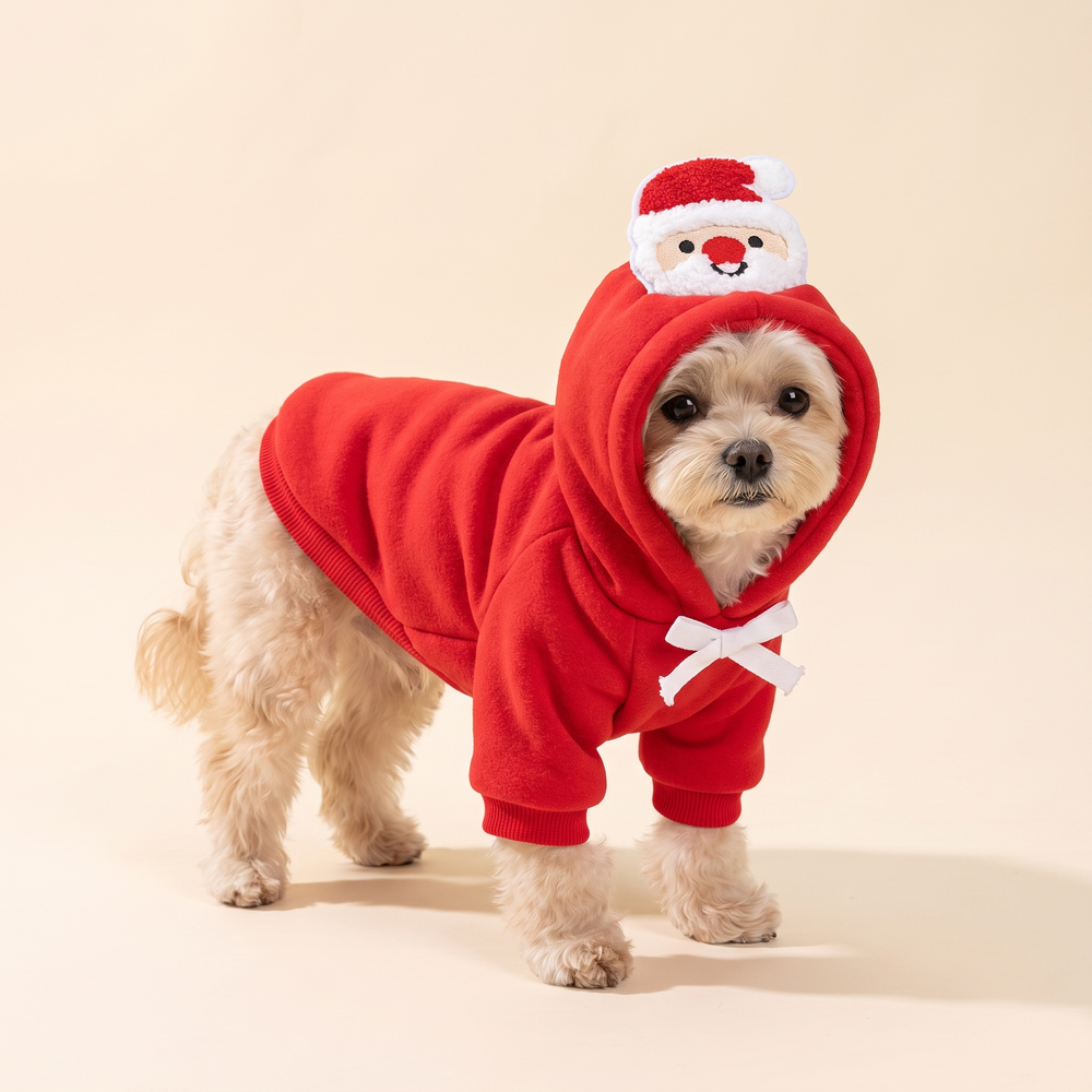 Dog wearing the red Santa print Christmas hoodie