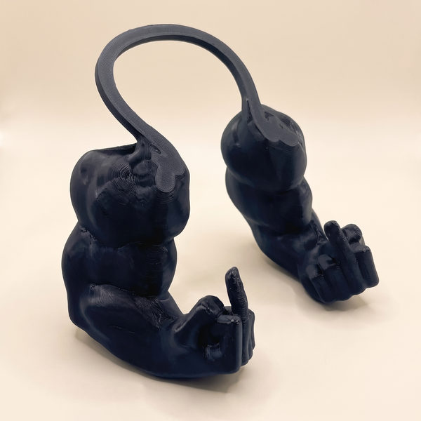 Muscle arm cat prop in black, two 3D-printed arms with raised-finger hands joined by a curved band