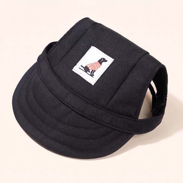 Black dog baseball cap with a curved visor and small dog-patch label