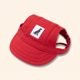 Red dog baseball cap with visor and ear holes, side view