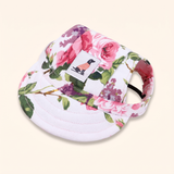 White dog baseball cap with pink and purple floral print