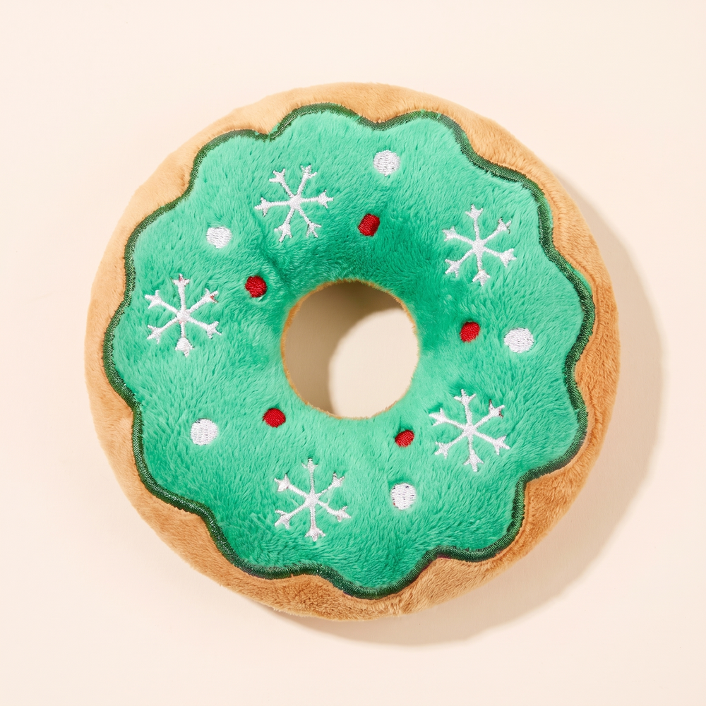 Green donut plush squeaky dog toy