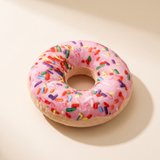 Pink frosted sprinkle doughnut plush squeaky dog toy